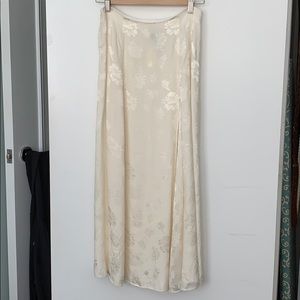 Off-white/cream patterned skirt.